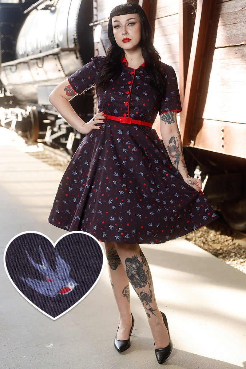 A model wearing Navy Blue Swallow Shirt Dress