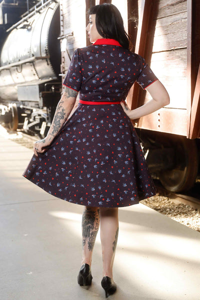 Back view of model wearing Navy Blue Swallow Shirt Dress
