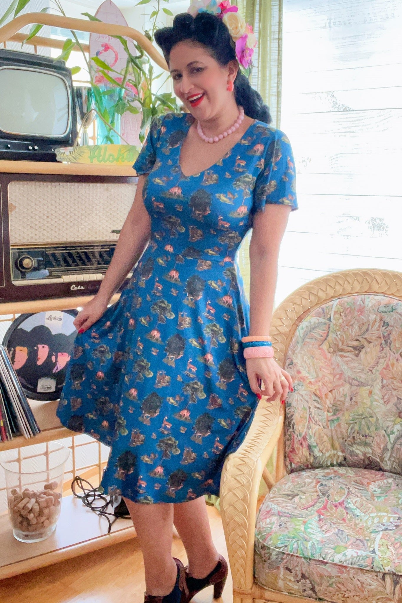 A model wearing Navy Deer Short Sleeved Dress