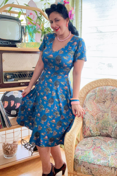 A model wearing Navy Deer Short Sleeved Dress