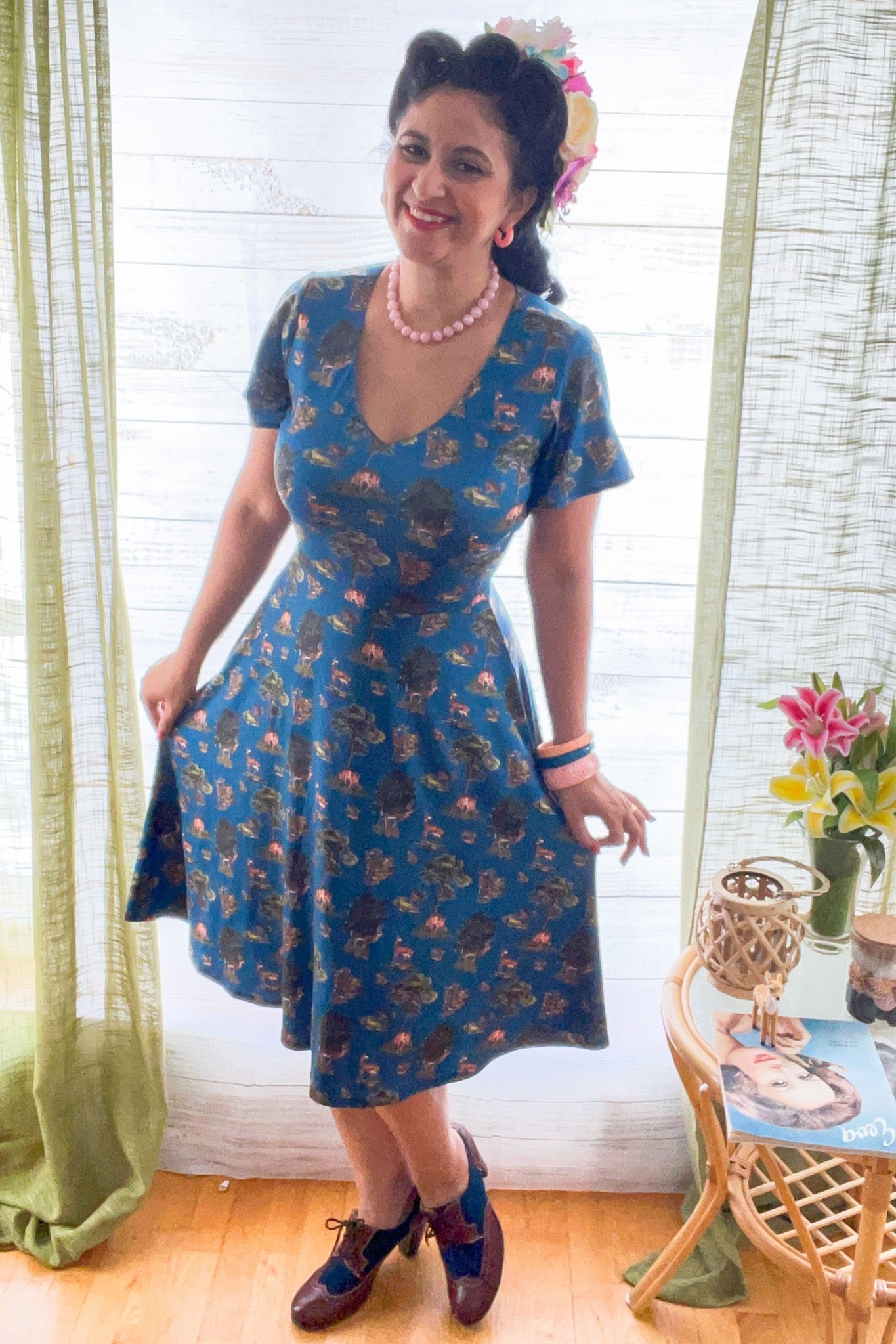 A model wearing Navy Deer Short Sleeved Dress