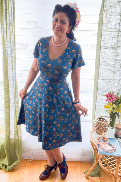 A model wearing Navy Deer Short Sleeved Dress