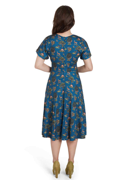 A model wearing Navy Deer Short Sleeved Dress