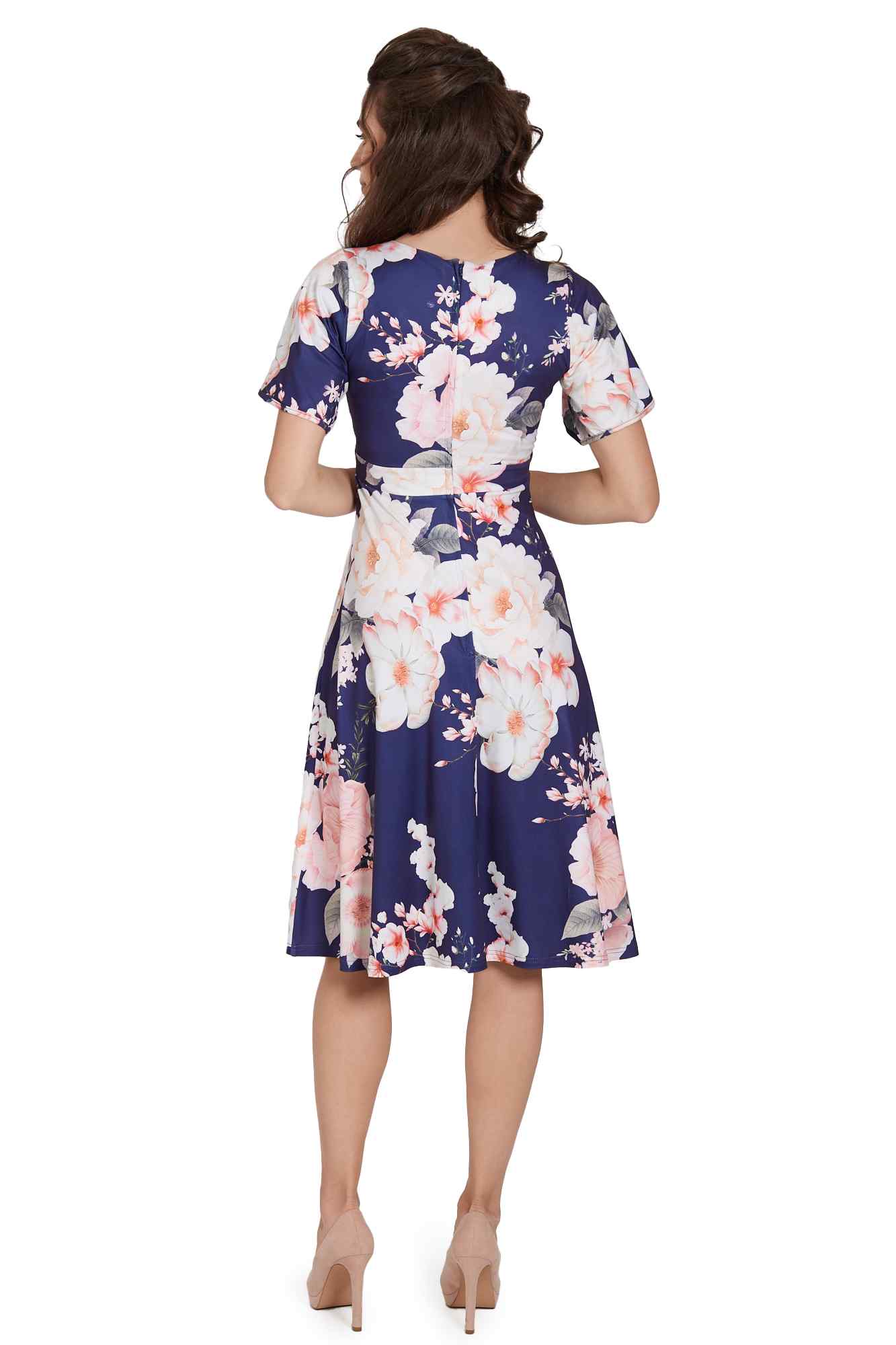 Model wearing  Navy Floral Petal Sleeve Tea Dress