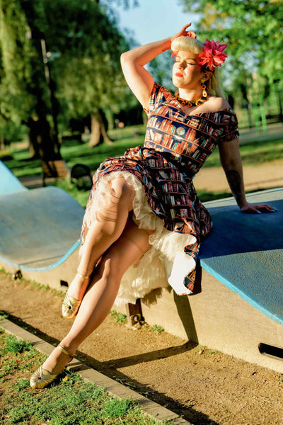 A lady wearing an Off Shoulder Book & Owl Dress