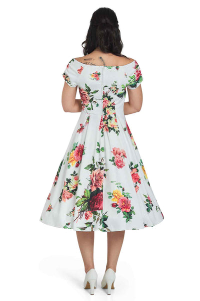 Model wearing Off Shoulder Rose Swing Dress In White