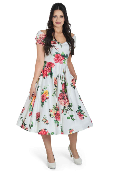 Model wearing Off Shoulder Rose Swing Dress In White