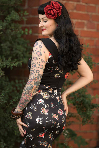 A model wearing an Old School Tattoo Wiggle Dress