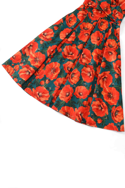 Close up view of Orange Poppy Off Shoulder Dress In Green