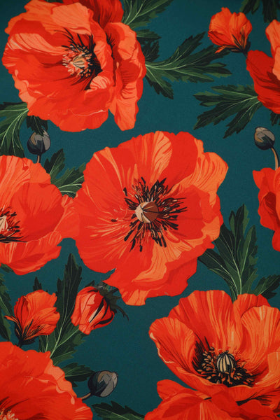 Close up view of Orange Poppy Off Shoulder Dress In Green