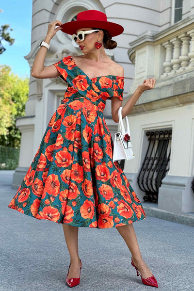 A model wearing a Beverly Orange Poppy Off Shoulder Dress In Green
