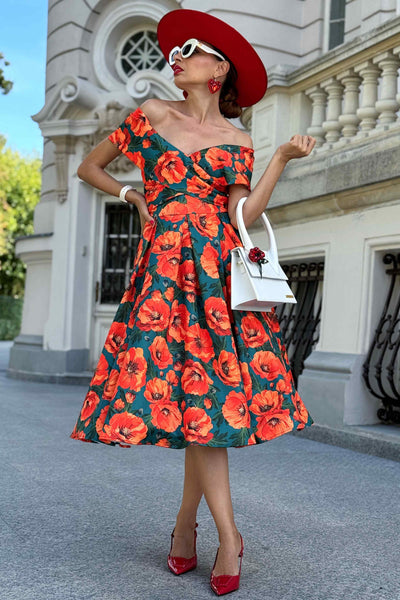 A model wearing a Beverly Orange Poppy Off Shoulder Dress In Green
