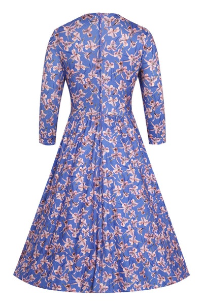 Back view of Orchid Floral Print Long Sleeved Dress in Blue