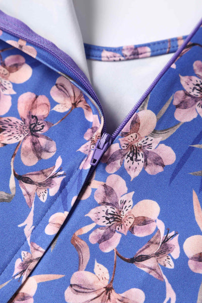 Close up view of Orchid Floral Print Long Sleeved Dress in Blue