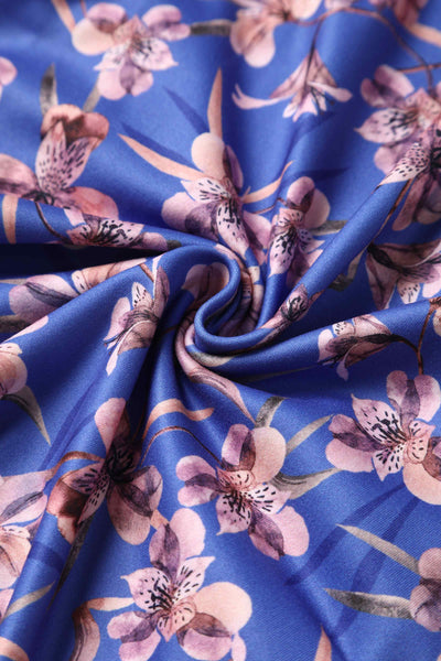 Close up view of Orchid Floral Print Long Sleeved Dress in Blue