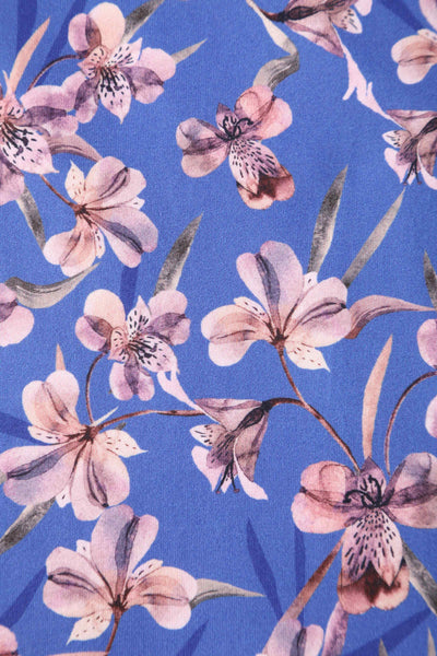 Close up view of Orchid Floral Print Long Sleeved Dress in Blue