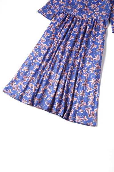 Close up view of Orchid Floral Print Long Sleeved Dress in Blue