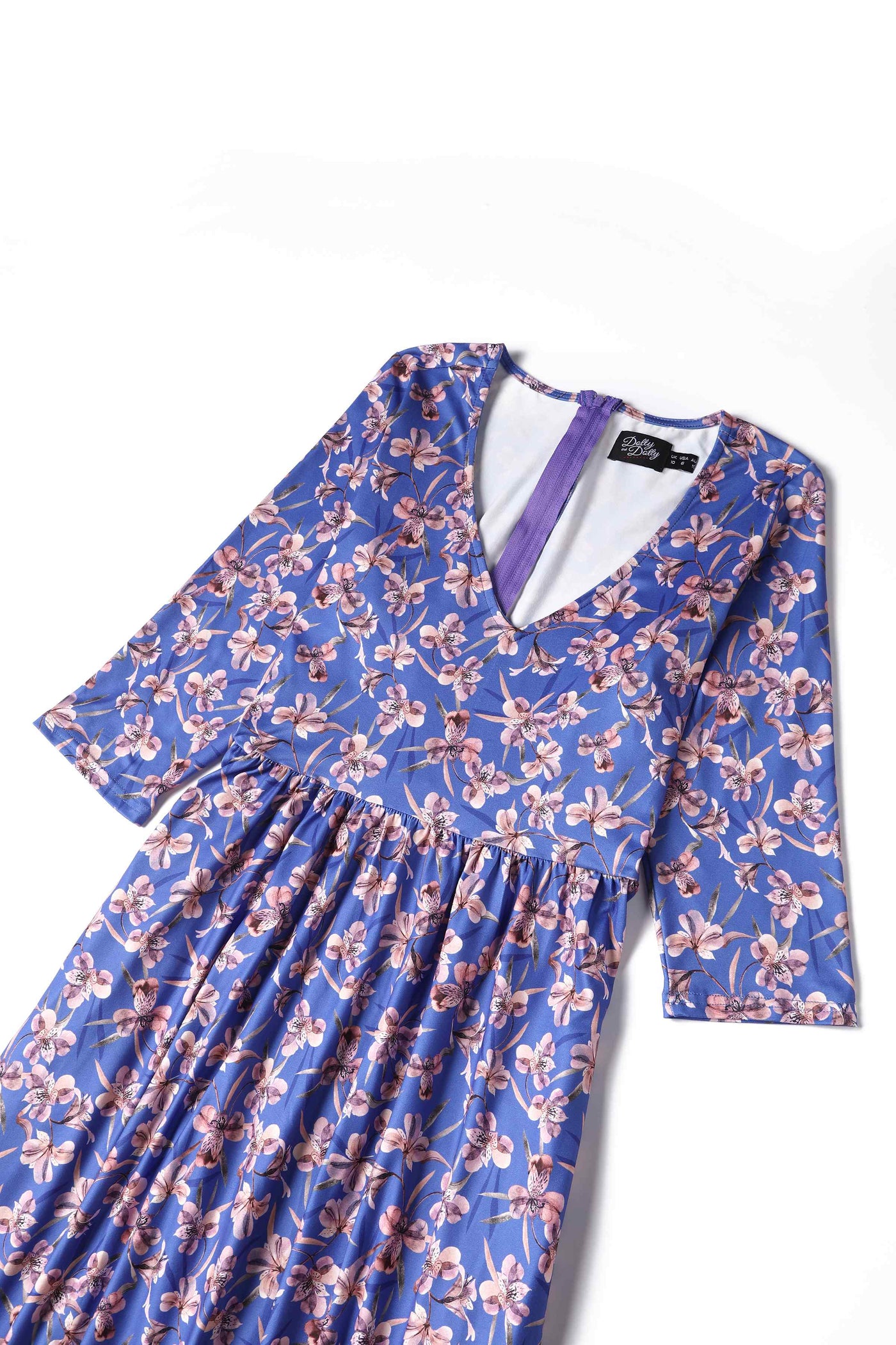 Close up view of Orchid Floral Print Long Sleeved Dress in Blue
