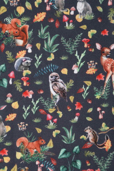 Close up view of Owl & Deer Off Shoulder Dress In Dark Green