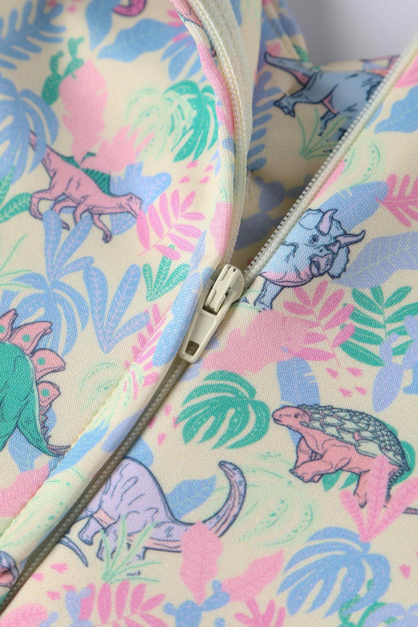 Close up View of Pastel Dinosaur Off Shoulder Dress