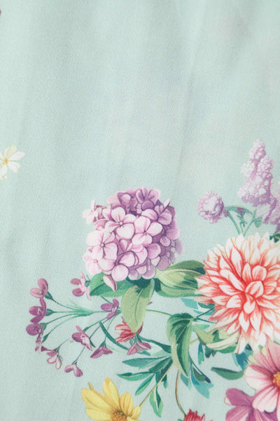 Close up view of Pastel Floral Swing Dress In Baby Blue