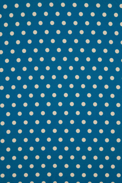 Close Up View of Peacock Blue and Cream Polka Dot Wrap Dress