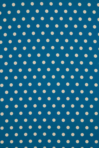 Close Up View of Peacock Blue and Cream Polka Dot Wrap Dress