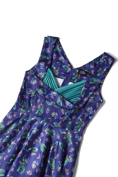 Close up view of Peacock Print Pleated Bust Dress in Purple