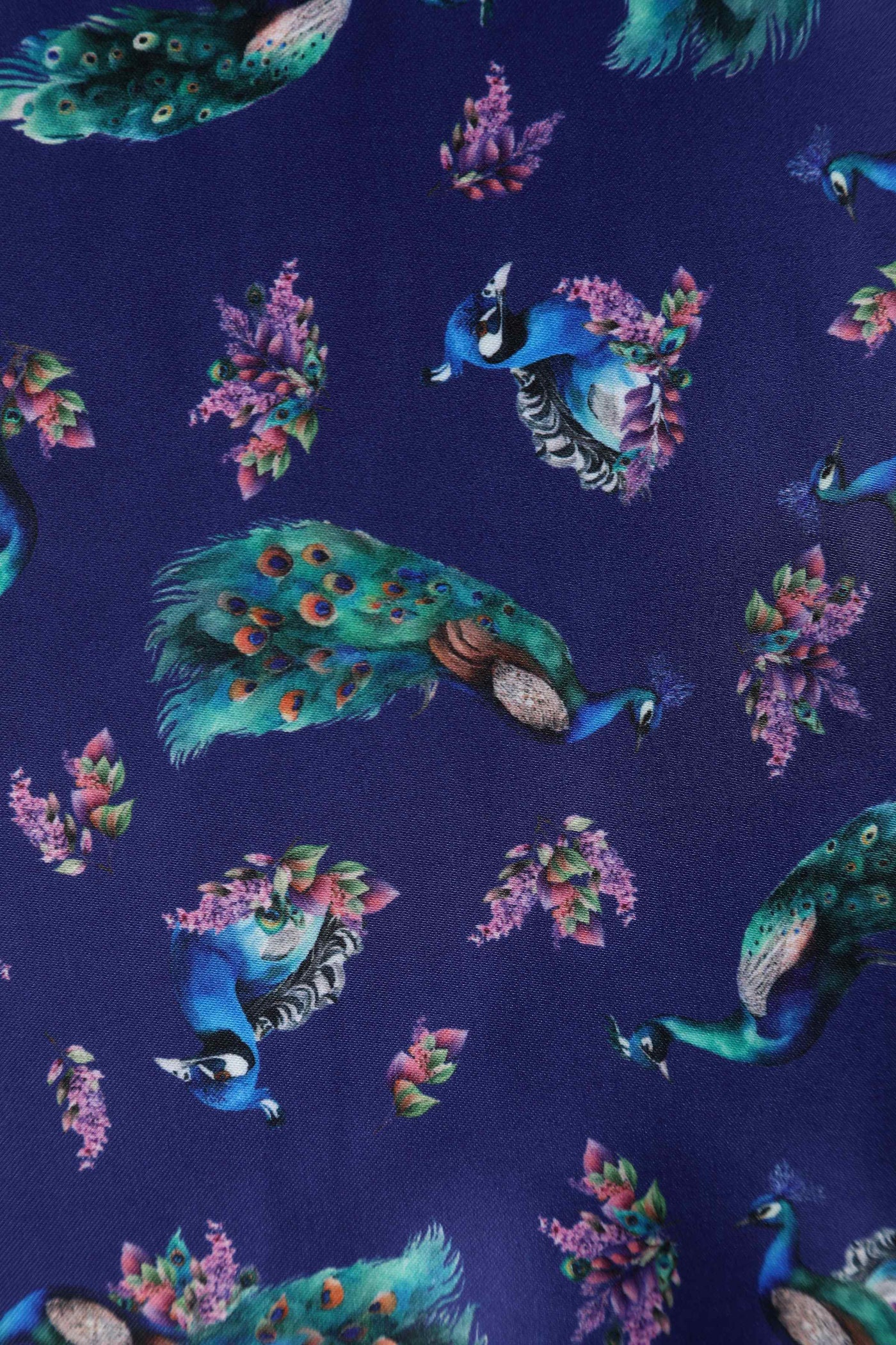 Close up view of Peacock Print Pleated Bust Dress in Purple