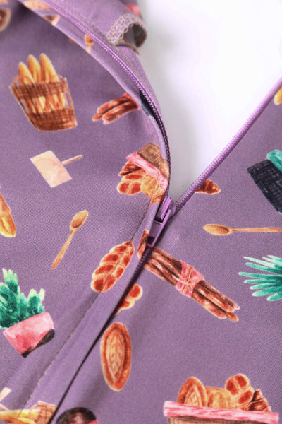 Close up view of Petal Sleeved Tea Dress with Pastry Print in Purple