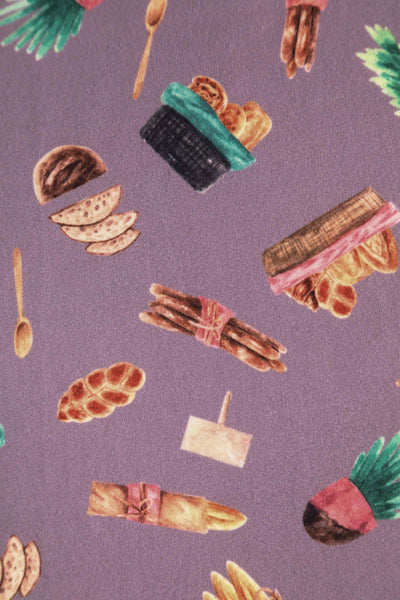 Close up view of Petal Sleeved Tea Dress with Pastry Print in Purple
