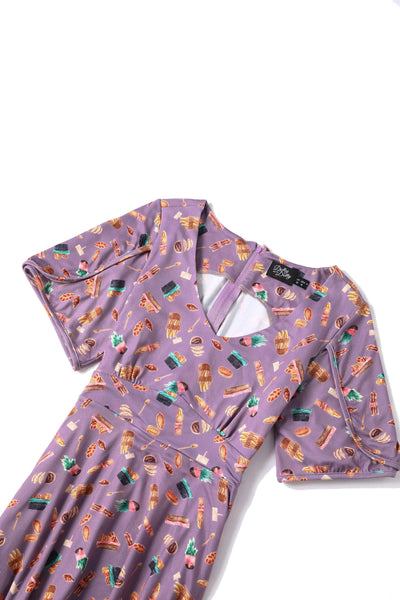 Close up view of Petal Sleeved Tea Dress with Pastry Print in Purple