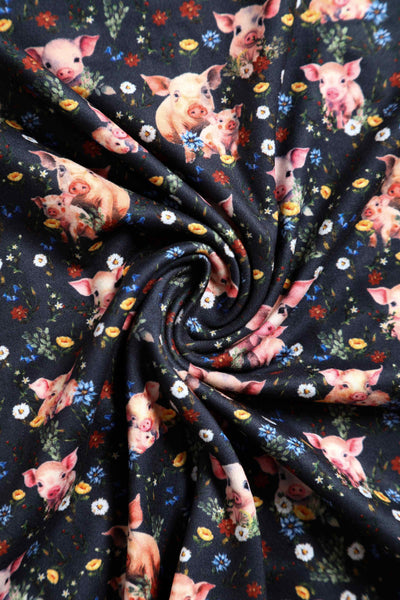 Close up view of Pig Print Petal Sleeved Dress in Black