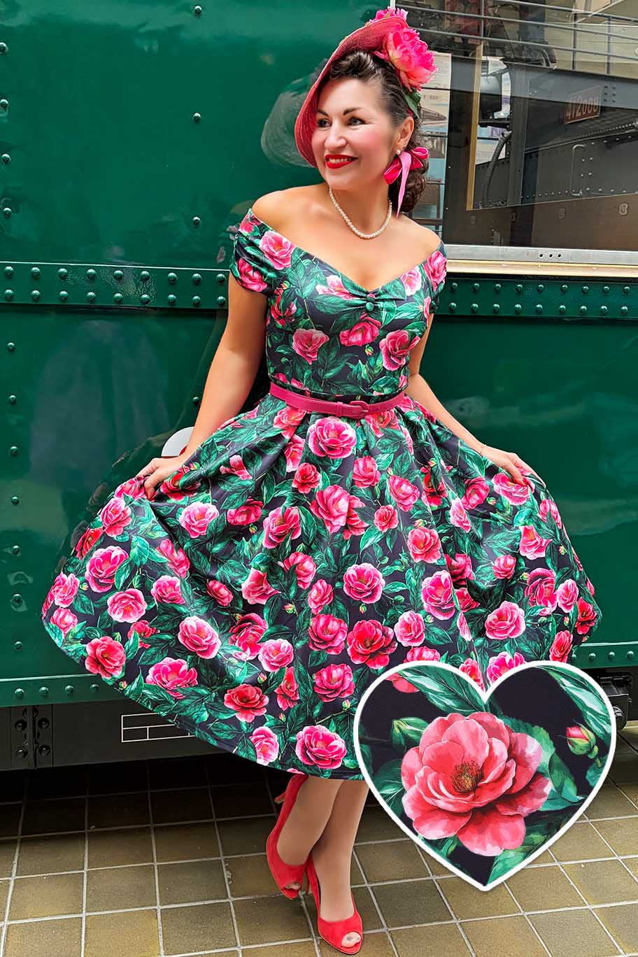 A lady wearing a Lily Pink Camellia Off Shoulder Dress In Black