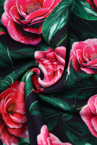 Close up view of Lily Pink Camellia Off Shoulder Dress In Black