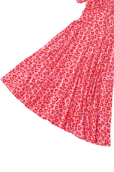 Front view of the bottom of Julia Pink Cheetah Print Midi Dress