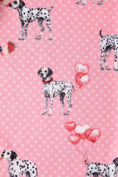 Close up of pink dalmatian dog and heart balloons fabric 