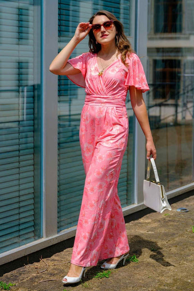 A lovely model wearing an Esther Pink Floral Jumpsuit