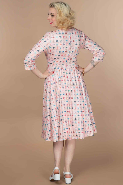 A lady wearing a Pink Gemstone Flared Dress