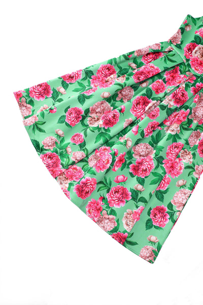 Close up view of Amanda Pink Peony Flared Dress In Mint Green