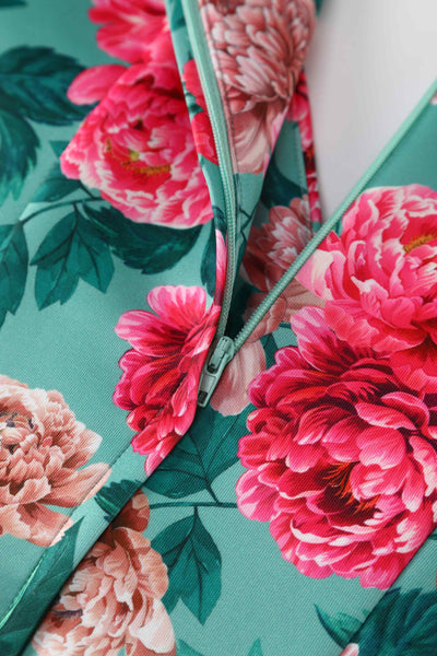 Close up view of Pink Peony Off Shoulder Dress In Mint Green