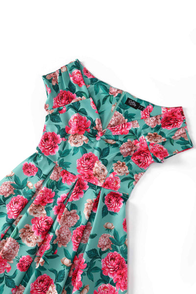 Close up view of Pink Peony Off Shoulder Dress In Mint Green