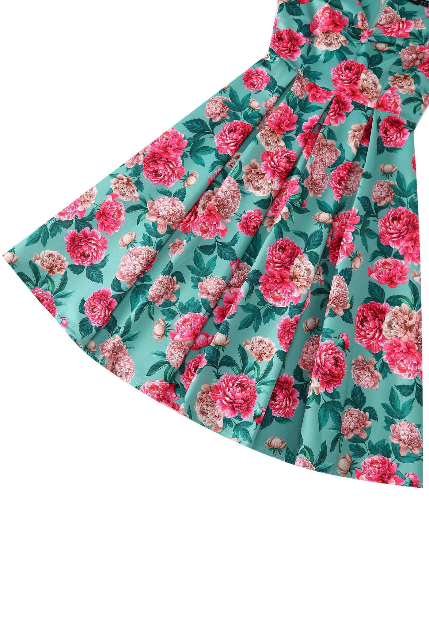 Close up view of Pink Peony Off Shoulder Dress In Mint Green