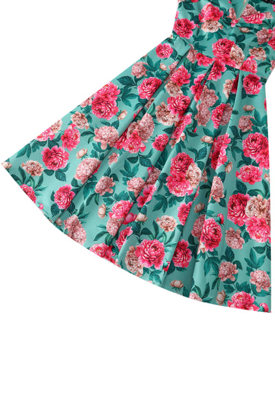 Close up view of Pink Peony Off Shoulder Dress In Mint Green