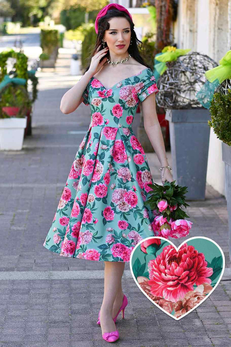 Model wearing a Pink Peony Off Shoulder Dress In Mint Green