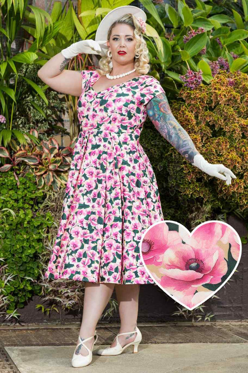 A model wearing Pink Poppy Off Shoulder Dress