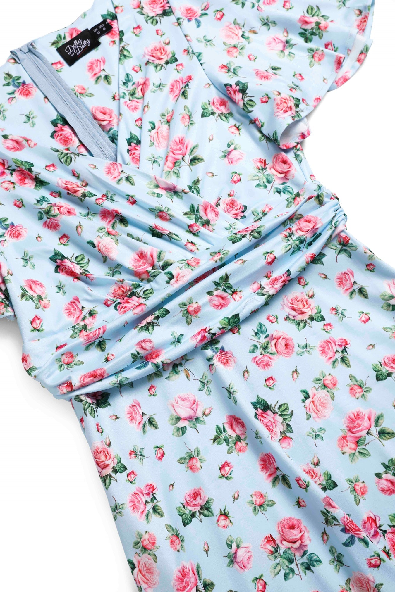 Close up view of Pink Rose Day Dress In Baby Blue