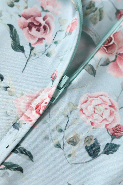 Close up view of Pink Rose Print Flared Dress In Baby Blue