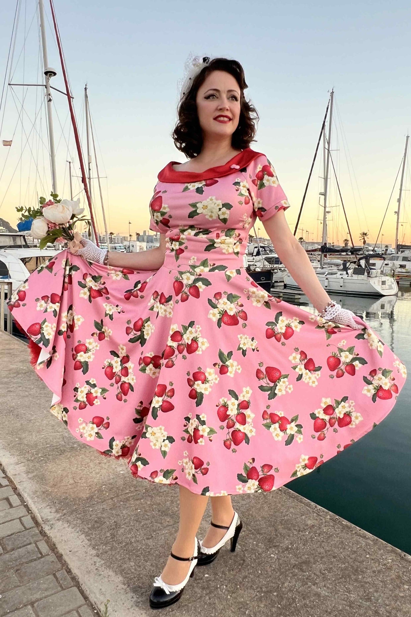 A model wearing a Pink Strawberry Flared Dress