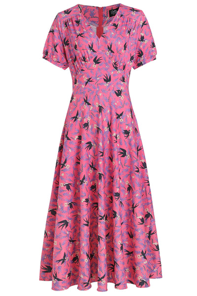 pink short sleeved tea dress, with swallow bird print, front view